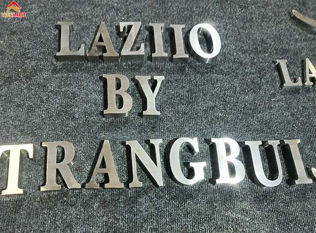 gia-cong-chu-inox-trang-laziio