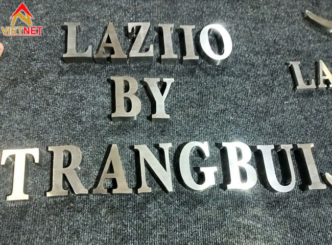 gia-cong-chu-inox-trang-laziio