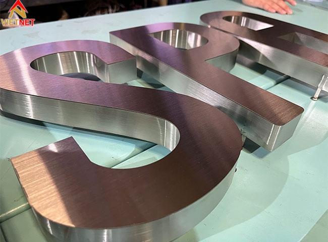 Gia công chữ inox trắng Nến Spa